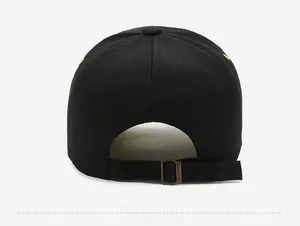 Detail of adjustable black cotton baseball cap with bronze metal buckle and embroidery