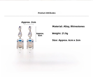 Détail montrant les dimensions des boucles d'oreilles géométriques en cristal de goutte d'eau