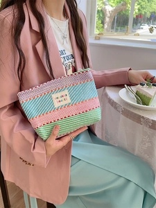 Portable colorful striped woven makeup bag with large capacity for travel storage