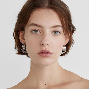 Silver layered stacked hoop earrings for women in polished stainless steel minimalist style