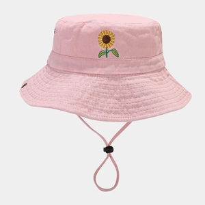 Detail of pink cotton bucket hat featuring sunflower embroidery and adjustable wind rope