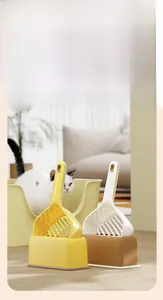 Cat litter shovel set with base, featuring a large-hole sieve design in yellow and cream