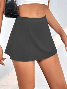 Detailed side view of high-waist charcoal grey mini skirt with A-line side slit design