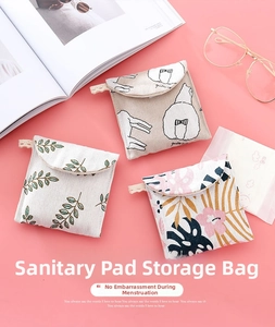 Detailed view of canvas sanitary pad pouches with leaf, bear and monstera floral patterns