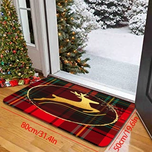 Detailed view of Christmas reindeer mat 80x50cm with red plaid on indoor wood floor