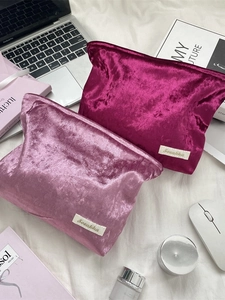 Velvet makeup bag set with gold sheen finish for travel storage and organization