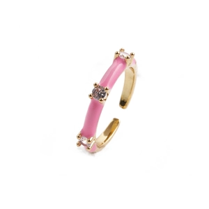 Pink enamel gold-plated open ring with three sparkling clear zircons in a minimalist style