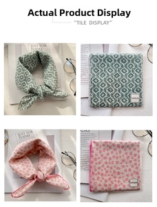 Detail of floral and geometric print scarves with UNIQUE label and decorative styling