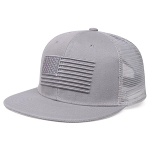 Detail of 3D embroidered American flag on grey mesh trucker hat with flat brim
