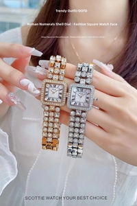 Detail of square shell face watch with Roman numerals and shimmering crystal bracelet