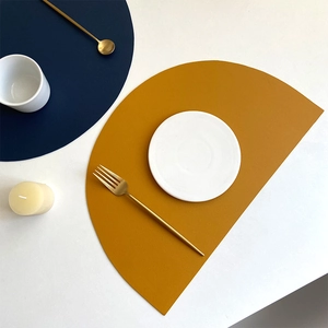 Nordic minimalist PU leather placemats in round navy blue and semi-circle mustard yellow