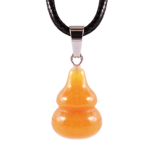 Detailed close-up of golden amber gourd pendant with black hand-woven cord necklace