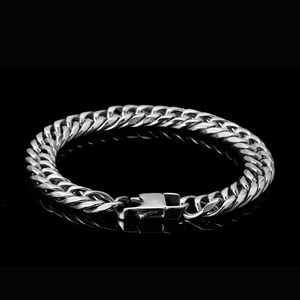 Mens hip hop stainless steel cuban link bracelet with durable clasp on black background