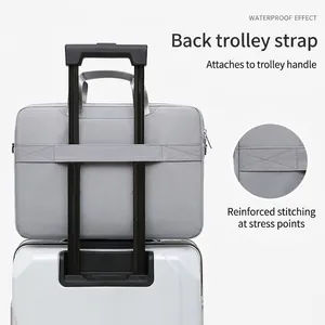 Minimalist gray 14 inch laptop sleeve bag with waterproof fabric and luggage strap feature