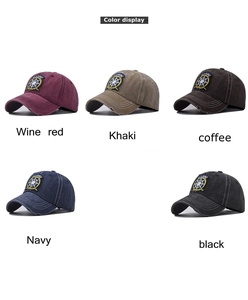 Detail display of five colors of washed cotton baseball caps with marine embroidery