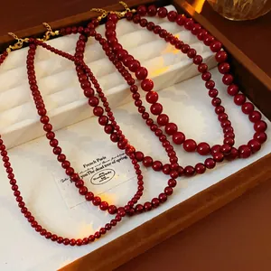 Vintage style Ancora red bead necklace in stainless steel with golden lobster clasp