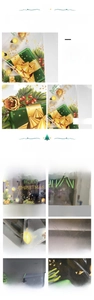 Close-up of double-sided Christmas window stickers with festive gift box and pine branch