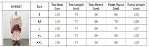 Detailed size chart for two-piece printed top and high-waisted pants set in cm