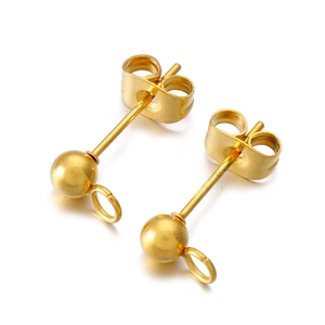 Macro shot of gold ball stud earring findings with hanging loops and butterfly backs