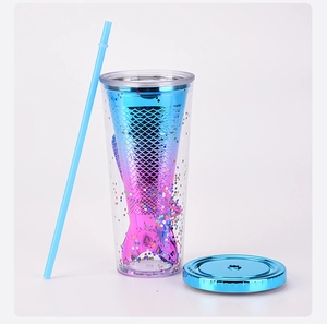 Detail of double-layer mermaid tail tumbler with blue purple gradient and sequins