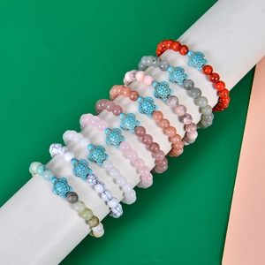 Natural turquoise and lava stone turtle bracelets in various colors for beach energy