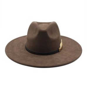 Detailed view of the dark brown fedora featuring a black leather band and gold wing buckle