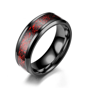 Polished black stainless steel ring for men featuring a red Celtic dragon pattern inlay