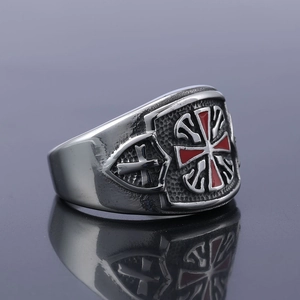 Vintage men's silver ring with red cross relief and a weathered metal finish