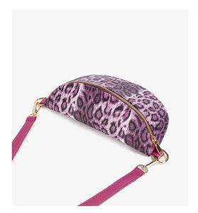 Detail of purple leopard print fanny pack with golden zipper and magenta leather strap