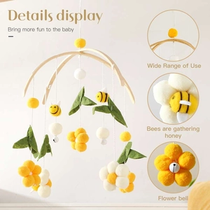Wooden baby mobile with hanging bees and felt flowers for crib nursery decoration