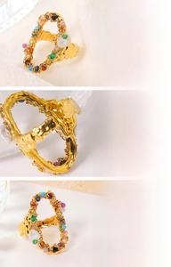 Detailed macro view of 18K gold plated textured ring with freshwater pearl and colorful stones