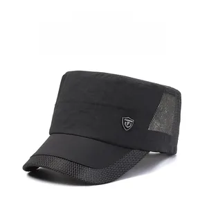 Close-up of black breathable flat top cap featuring mesh side panels and shield logo