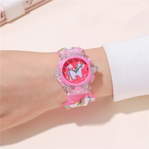 Detail showing pink LED glowing watch for kids with 3D cartoon unicorn on silicone strap