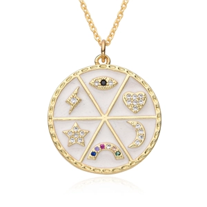 Detail of gold pendant with colorful zircon eye heart and moon enamel symbols