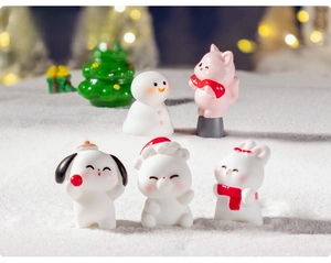 Miniature Christmas figurines set featuring cute animals playing in artificial snow
