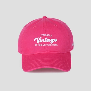 Detail of high-quality embroidery on rose red cotton baseball cap with vintage lettering
