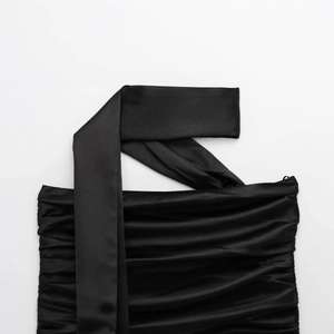 Elegant black satin top featuring a pleated texture and a chic halter neck tie design