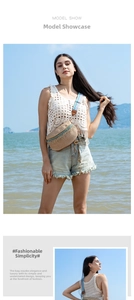 Detail of straw crossbody bag with colorful fringe beads and ethnic style woven strap