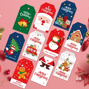 Detailed view of assorted Christmas gift tags featuring Santa and snowman patterns