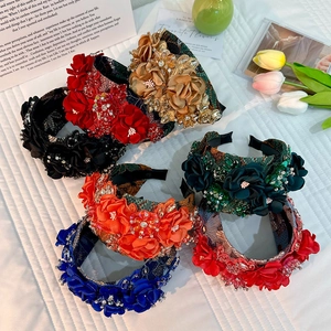 Handmade fabric flower headbands with sparkling rhinestones in various vibrant colors