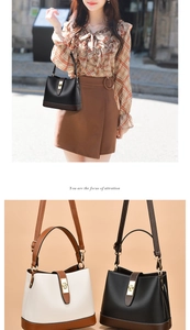 Detail of contrast bucket bag with metal twist lock and dual strap options