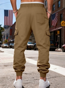 Outdoor street view showing the back fit of heavy-weight khaki cargo pants for men