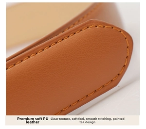 Detailed close-up of brown PU leather belt showing soft texture and yellow stitching