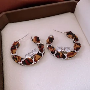 Vintage C-shaped leopard print fabric earrings with S925 silver needles and zircon