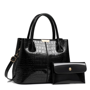 Elegant black crocodile pattern shoulder bag set with gold hardware and small pouch