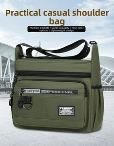 Detail of olive green multi-pocket waterproof nylon crossbody bag with side pouch