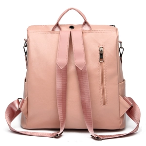 Minimalist soft leather anti-theft backpack for women in pastel pink with back zipper
