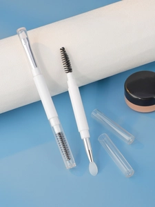 Dual-ended eyebrow and lash brush with spiral spoolie, silicone head and protective cap