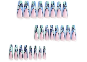 Macro detail of long coffin press-on nails with blue stitching and pink french design