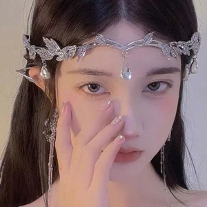 Silver bridal crown with crystal leaves and teardrop pendants with tassel earrings